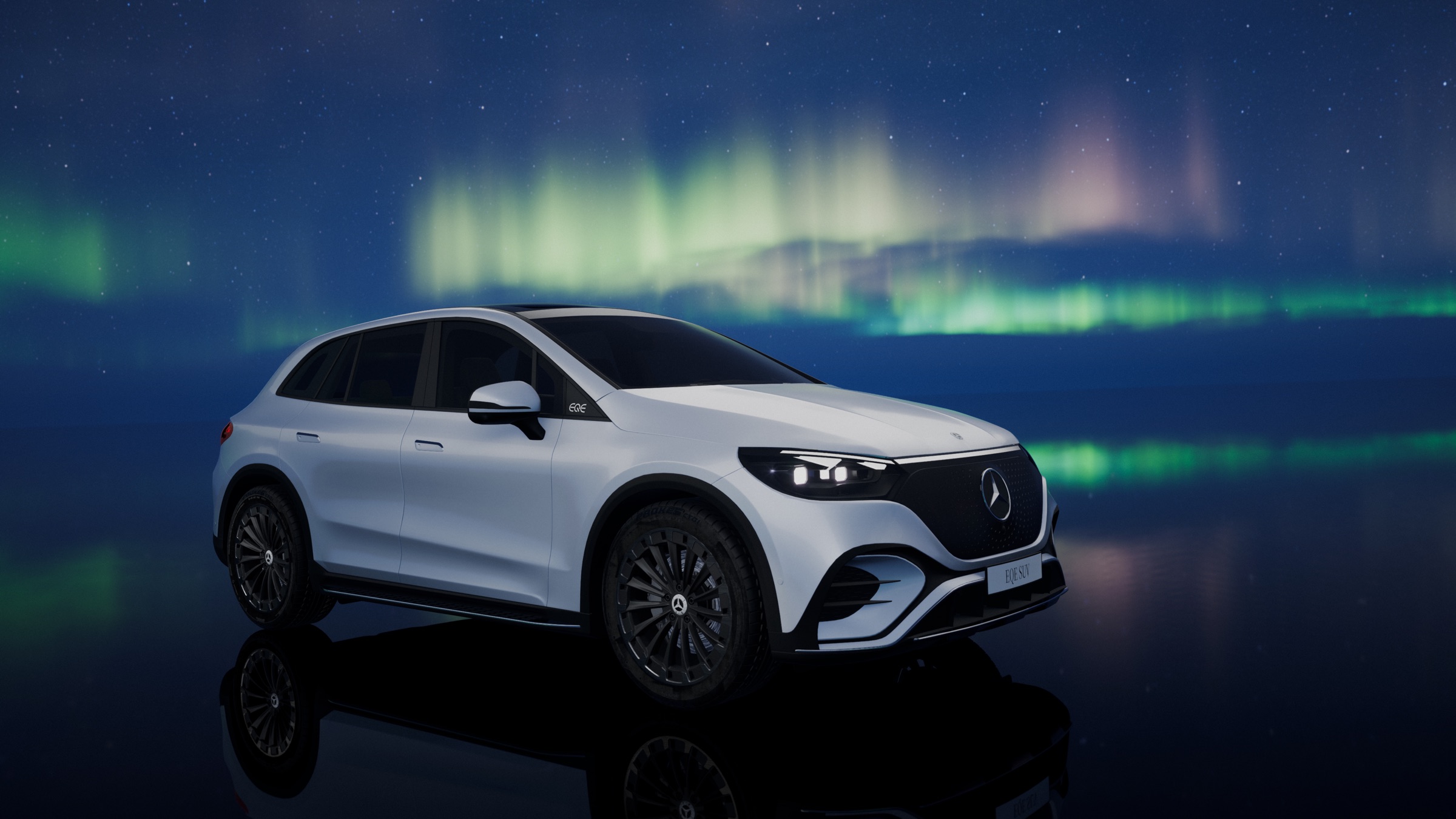 White electric SUV on a mirror surface under an aurora