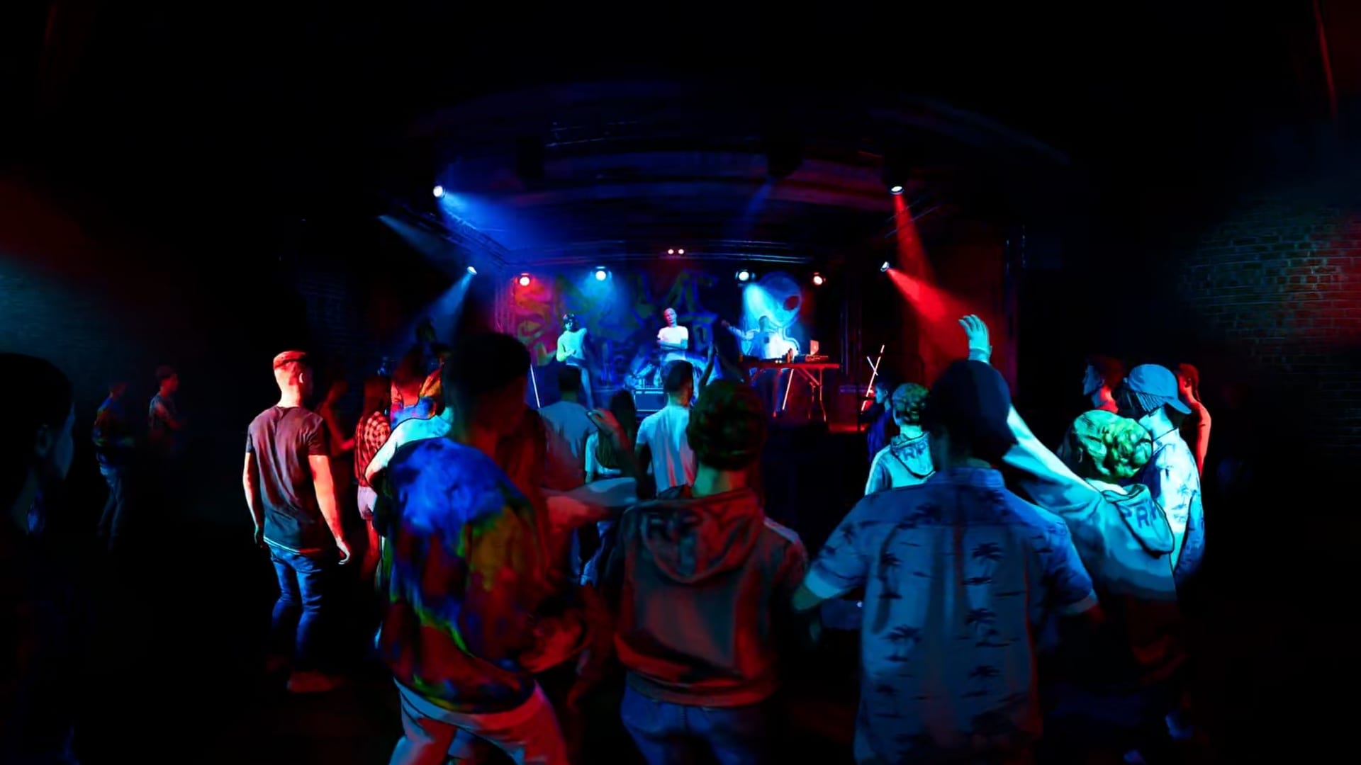 360 frame: a club concert, crowd in blue and red light in front of the stage